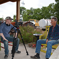 Jacob Rosdail making introductions with Wendel Hann prior to an interview. Photo Credits: Mary Harner